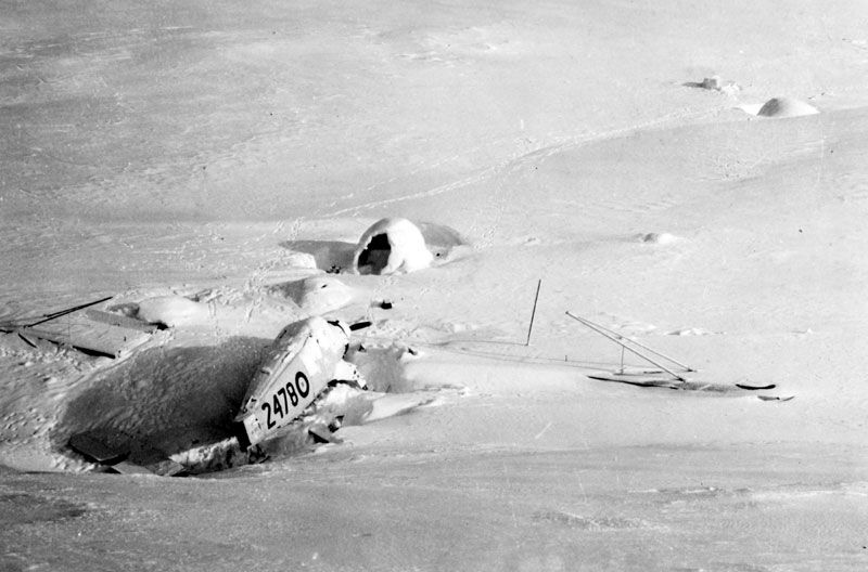 Photo: Aerial view of the crashed Norseman, dismantled for shipment; note nearby igloo.